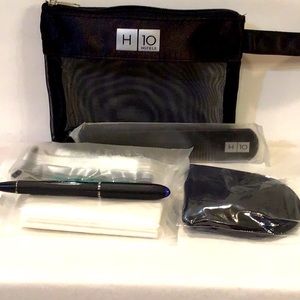 Unisex toiletry bag with products shown